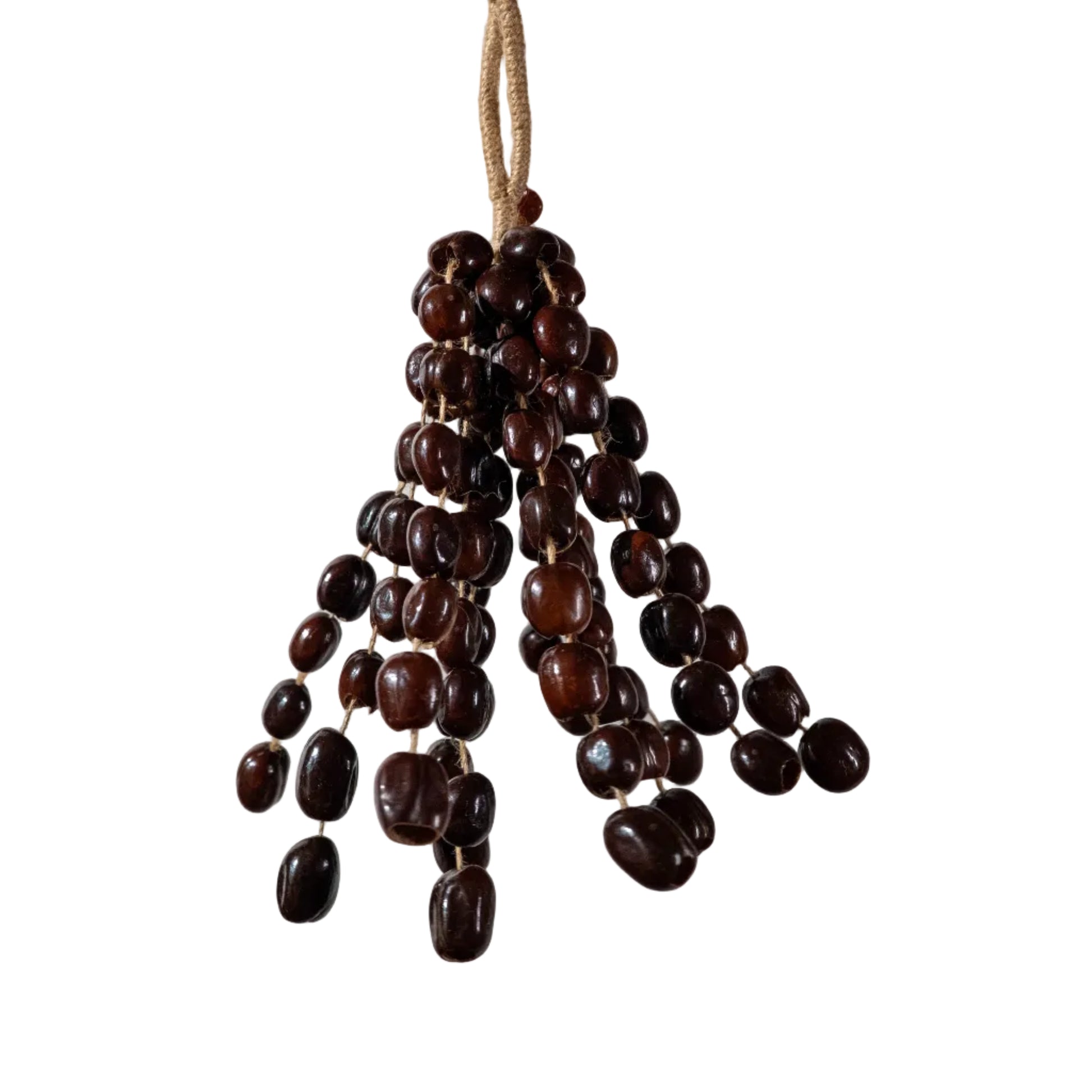 Large 96-seed Pala nut wind chime with peach pits and red beans on jute rope — flagship botanical sound healing and meditation decor