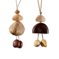 Handcrafted 24-element botanical bag charm in two colorways — beige and brown nut shell acoustic accessory for handbags and backpacks