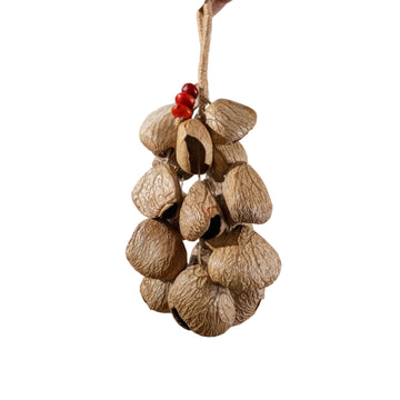 Handcrafted 18-seed Panji nut wind chime with red bean accents on hemp rope — botanical sound healing home decor