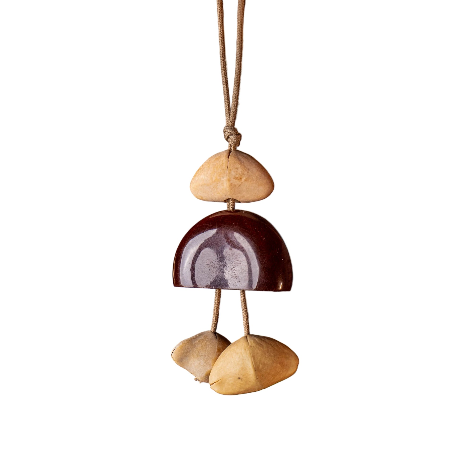 Handcrafted 24-element botanical bag charm in two colorways — beige and brown nut shell acoustic accessory for handbags and backpacks